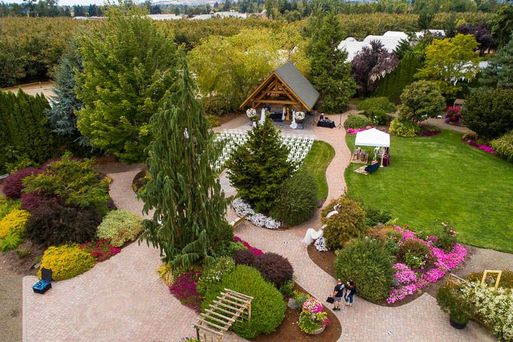 Log House Garden at Willow Lake gazebo ceremony area drone photo. Keizer Oregon Wedding Venue.